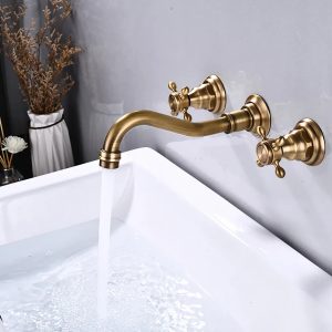 robinet vintage mural doré